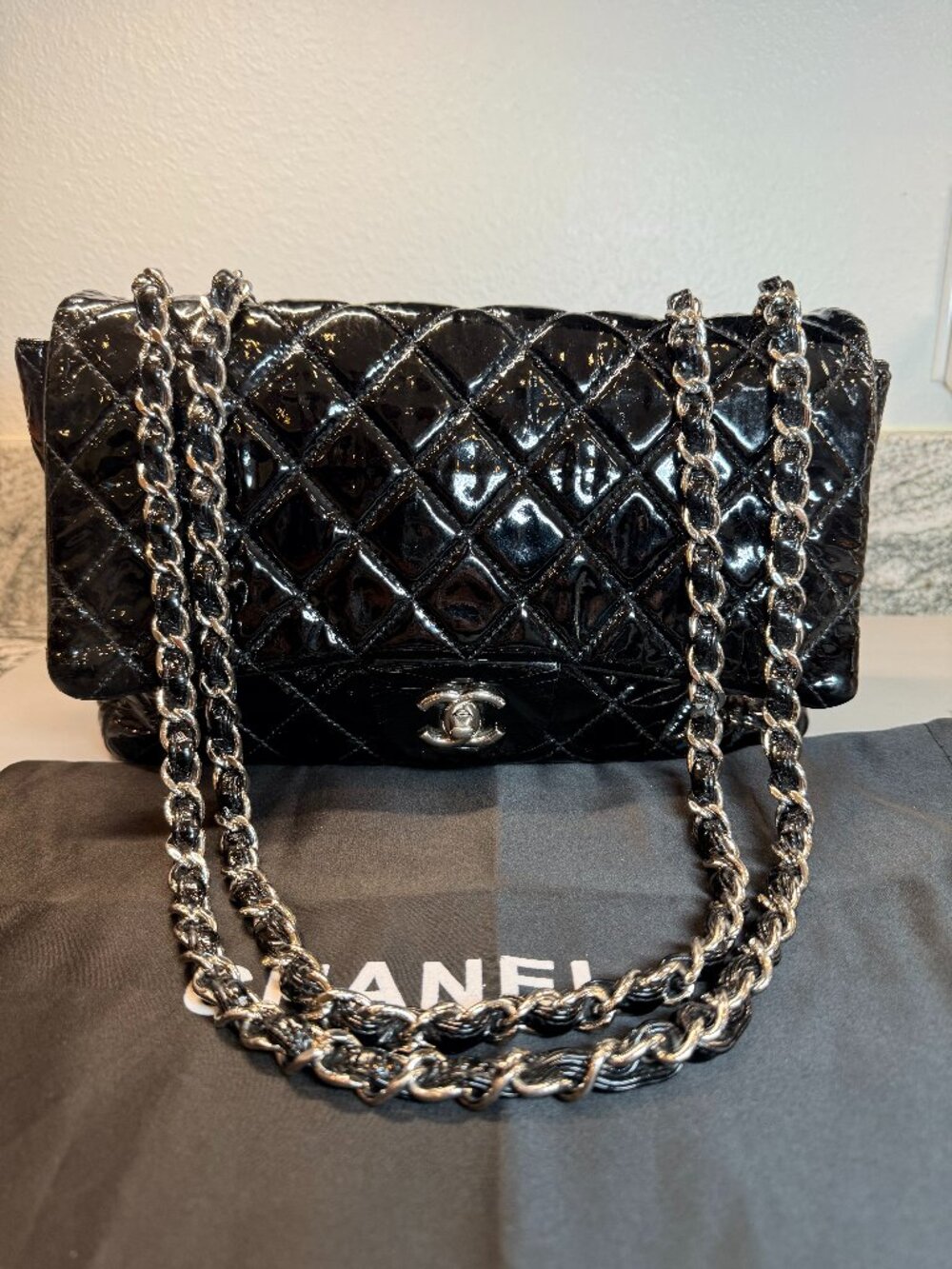 Chanel Medium Classic Flap Bag - Black Quilted Patent Leather Silver Hardware